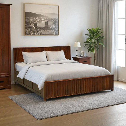 Bedroom with wooden bed, white bedding, and a window with curtains.