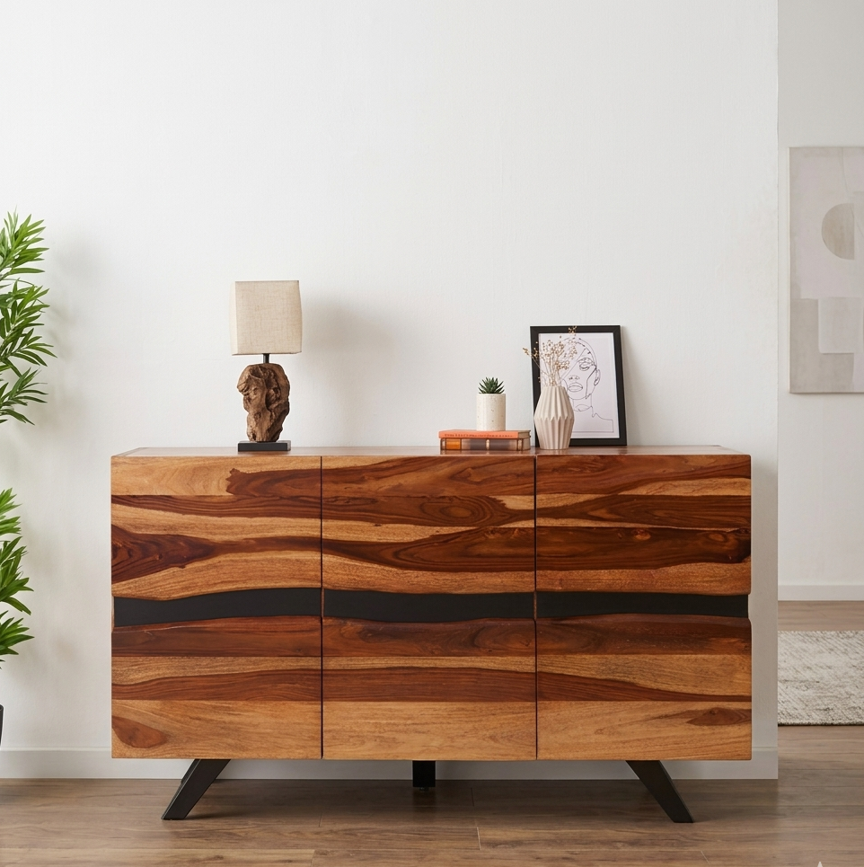 Wooden sideboard with decorative items against a white wall